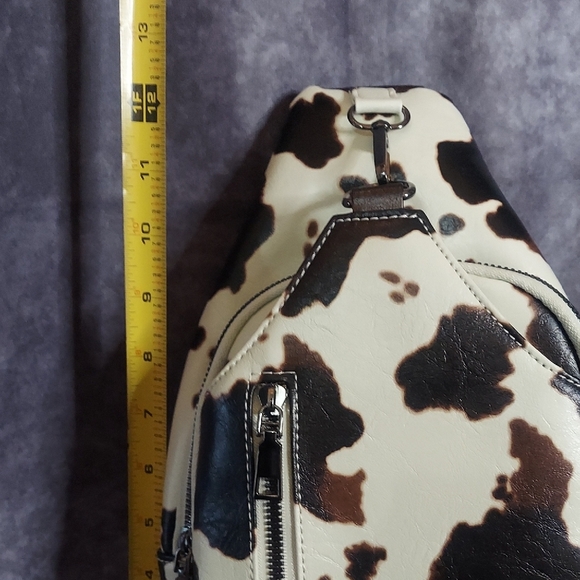 LNWOT Sam and Hadley Studded Cow Print Sling Backpack Faux Leather Brown White main image 7